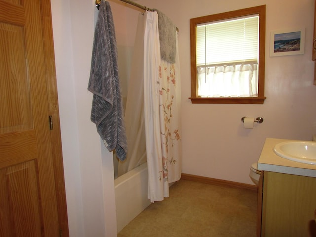 155 Crystal Cv, Waldoboro, ME 04572 - bathroom featuring vanity, tile patterned floors, shower / bath combination with curtain, baseboards, and toilet