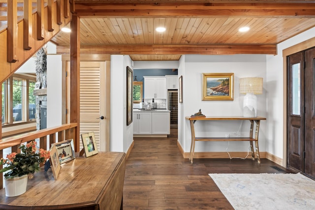 134 Zakelo Rd, Harrison, ME 04040 - entryway featuring wood ceiling with exposed beams, dark wood-style floors, healthy amount of natural light, recessed lighting, and baseboards