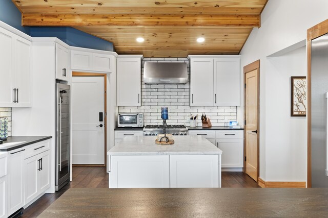 134 Zakelo Rd, Harrison, ME 04040 - kitchen featuring wall chimney exhaust hood, wooden ceiling, dark wood finished floors, white cabinetry, and recessed lighting