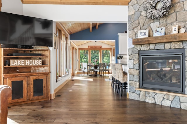 134 Zakelo Rd, Harrison, ME 04040 - living area featuring hardwood / wood-style flooring, a fireplace, and wooden ceiling