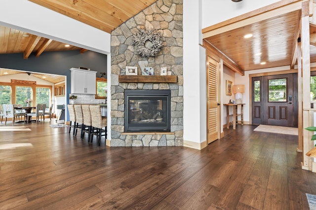 134 Zakelo Rd, Harrison, ME 04040 - living room featuring wooden ceiling, hardwood / wood-style flooring, healthy amount of natural light, a fireplace, and baseboards