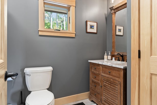 134 Zakelo Rd, Harrison, ME 04040 - half bathroom with toilet, vanity, and decorative backsplash