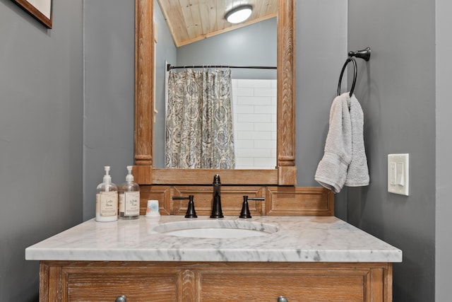 134 Zakelo Rd, Harrison, ME 04040 - full bath with vanity, vaulted ceiling, wooden ceiling, and a shower with curtain
