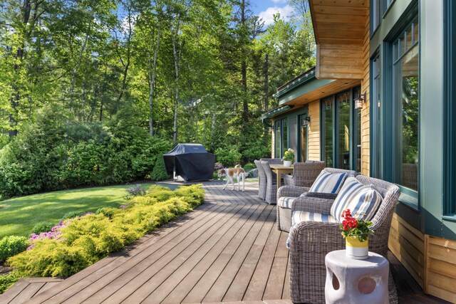 134 Zakelo Rd, Harrison, ME 04040 - deck featuring grilling area, a lawn, and view of wooded area