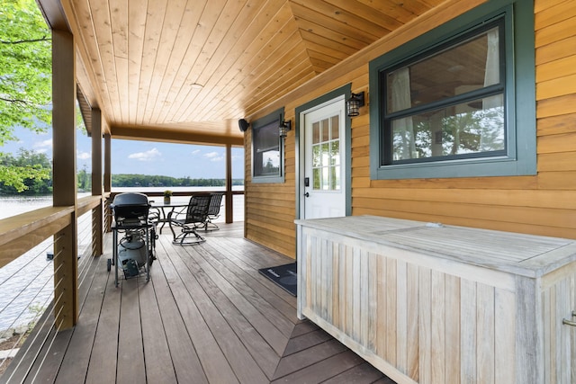 134 Zakelo Rd, Harrison, ME 04040 - porch with grilling area and a water view