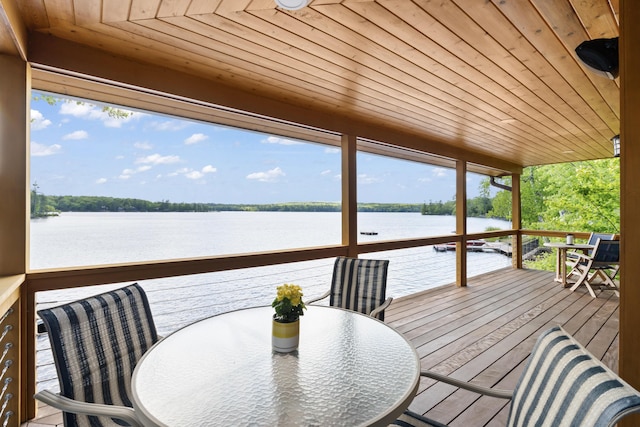 134 Zakelo Rd, Harrison, ME 04040 - deck featuring a water view and outdoor dining space