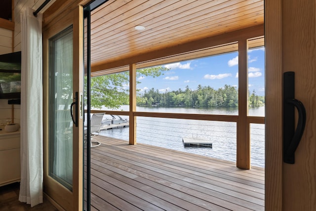 134 Zakelo Rd, Harrison, ME 04040 - wooden deck with a water view
