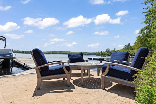 134 Zakelo Rd, Harrison, ME 04040 - view of patio with a water view and a dock