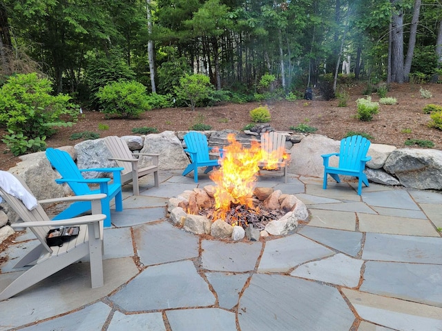 134 Zakelo Rd, Harrison, ME 04040 - view of patio / terrace featuring a fire pit