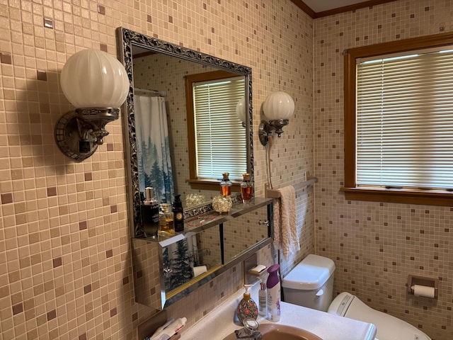 16 Steamboat St, Calais, ME 04619 - full bath with tile walls, toilet, and a shower with curtain