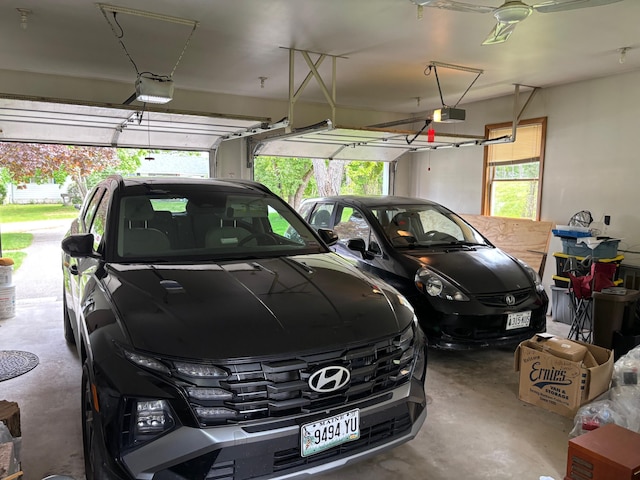 16 Steamboat St, Calais, ME 04619 - garage featuring a garage door opener