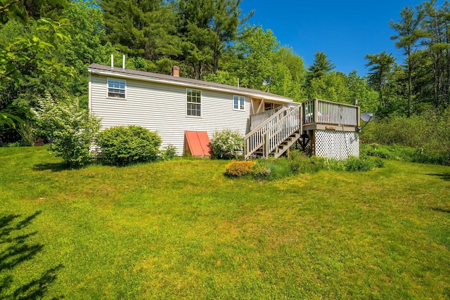 129 Lawrence Rd, Gray, ME 04039 - back of house featuring a deck, a lawn, a chimney, and stairway