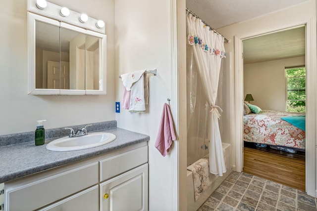 129 Lawrence Rd, Gray, ME 04039 - bathroom with vanity, shower / tub combo, and ensuite bathroom