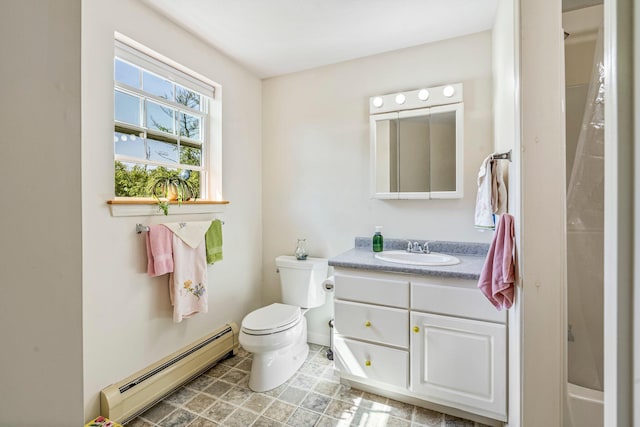 129 Lawrence Rd, Gray, ME 04039 - full bath with baseboard heating, vanity, toilet, and baseboards