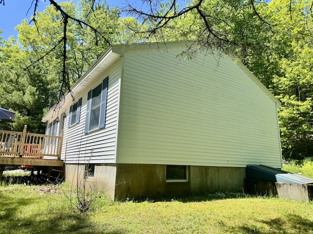323 Main St S, Searsmont, ME 04973 - view of side of home with a wooden deck and a lawn