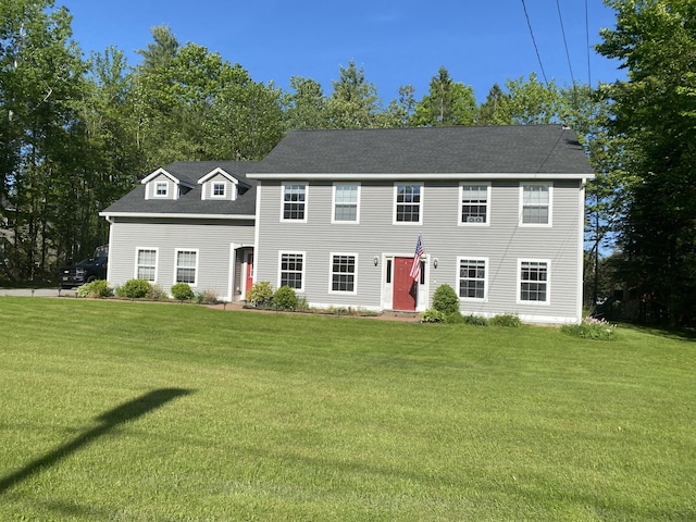 12 Cromwell Dr, Orono, ME 04473 - colonial-style house featuring a front lawn and a shingled roof