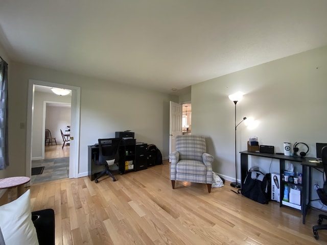 12 Cromwell Dr, Orono, ME 04473 - living area featuring light wood finished floors and baseboards