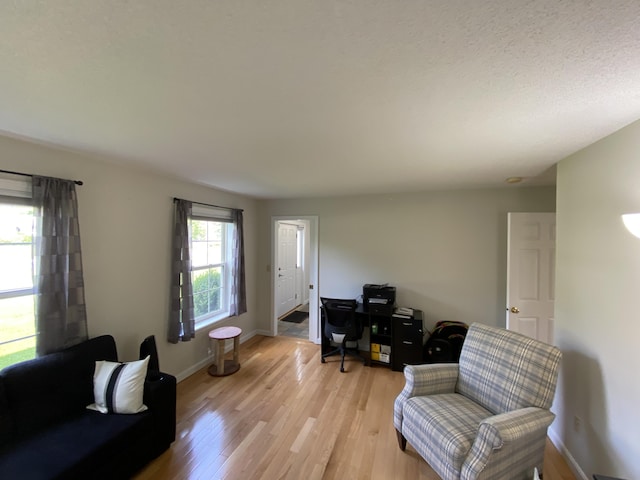 12 Cromwell Dr, Orono, ME 04473 - living area featuring a desk and light wood-style floors