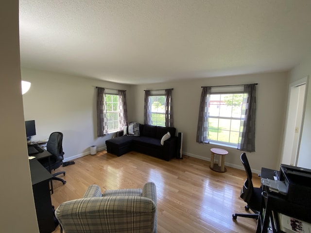 12 Cromwell Dr, Orono, ME 04473 - office area featuring wood finished floors and baseboards