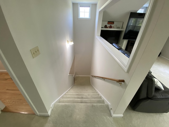 12 Cromwell Dr, Orono, ME 04473 - stairway with baseboards and carpet flooring