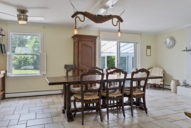 496 Coles Hill Rd, Wells, ME 04090 - dining space with baseboard heating, ornamental molding, plenty of natural light, and a ceiling fan