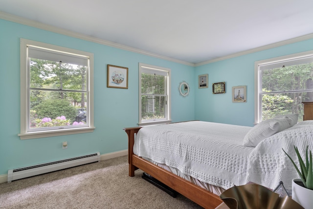496 Coles Hill Rd, Wells, ME 04090 - carpeted bedroom with a baseboard radiator, multiple windows, and crown molding