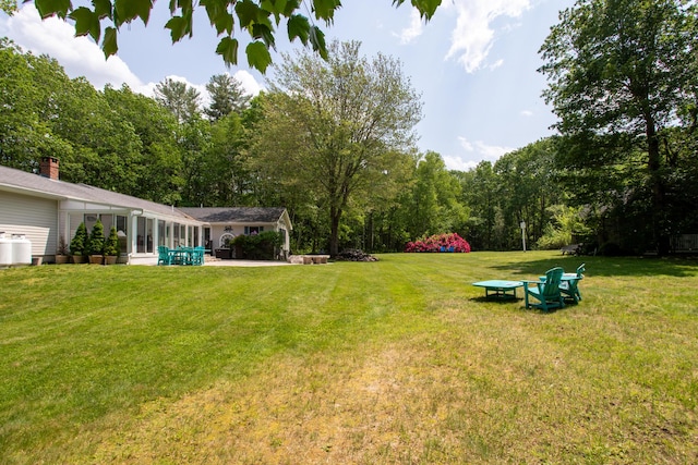 496 Coles Hill Rd, Wells, ME 04090 - view of grassy yard with a sunroom