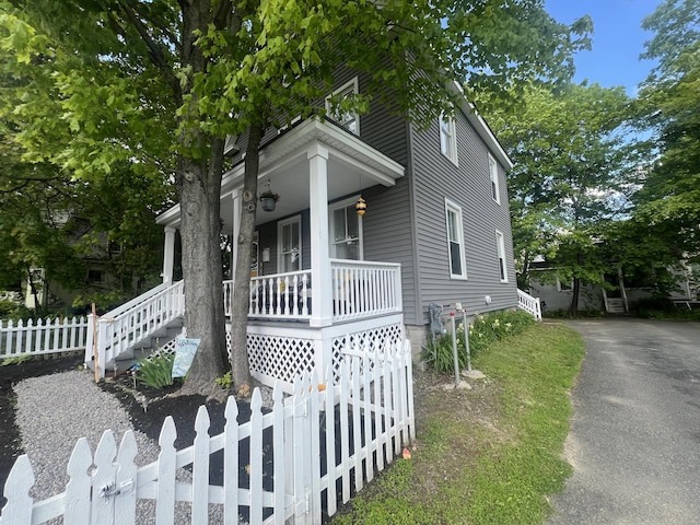 5 Columbia St, Augusta, ME 04330 - view of front facade featuring covered porch and stairway