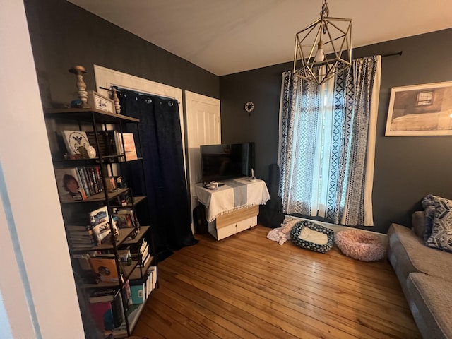 5 Columbia St, Augusta, ME 04330 - living area featuring a chandelier and hardwood / wood-style floors
