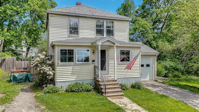 121 Bolton St, Portland, ME 04102 - view of front facade with entry steps, driveway, roof with shingles, and a chimney