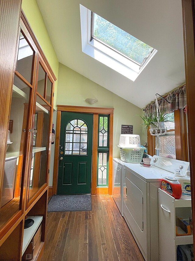 121 Bolton St, Portland, ME 04102 - washroom featuring washing machine and clothes dryer, dark wood-type flooring, and a skylight