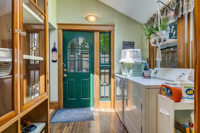 121 Bolton St, Portland, ME 04102 - entrance foyer with washing machine and dryer, vaulted ceiling, dark wood-type flooring, and baseboards