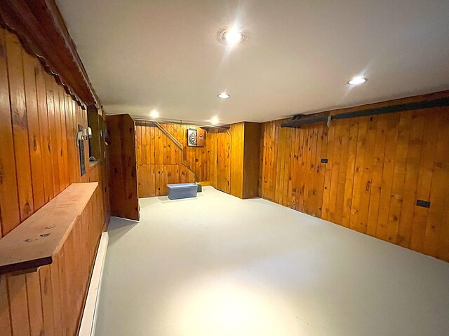 121 Bolton St, Portland, ME 04102 - finished basement with wooden walls, carpet, and recessed lighting