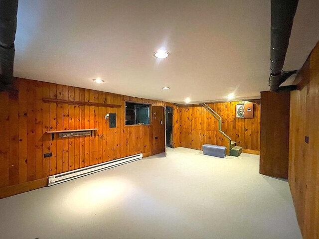 121 Bolton St, Portland, ME 04102 - finished below grade area featuring a baseboard radiator, wooden walls, stairway, carpet flooring, and recessed lighting