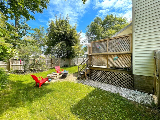 121 Bolton St, Portland, ME 04102 - view of yard with an outdoor fire pit and a deck