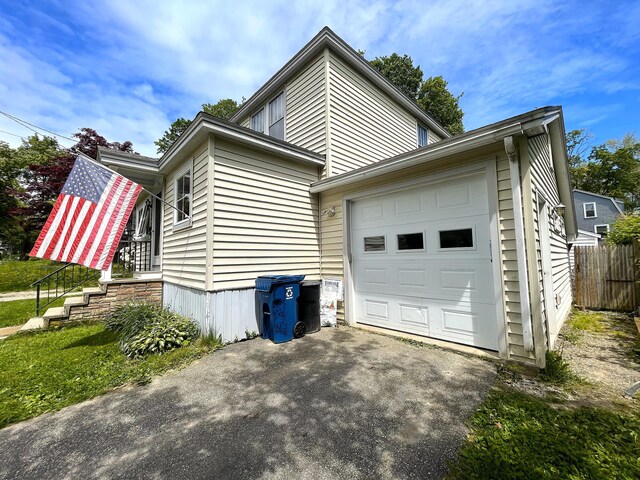121 Bolton St, Portland, ME 04102 - view of side of property with driveway and a garage