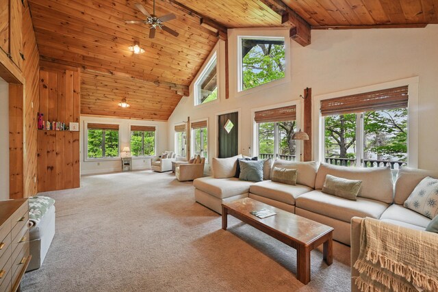 14 Greenleaf Ln, Monmouth, ME 04259 - carpeted living room with wooden ceiling with exposed beams, high vaulted ceiling, and ceiling fan