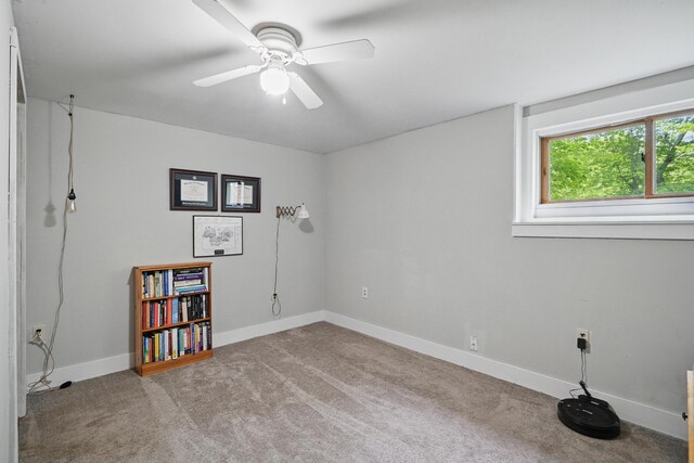 14 Greenleaf Ln, Monmouth, ME 04259 - carpeted spare room with baseboards and ceiling fan