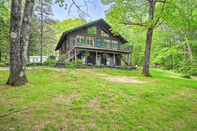 14 Greenleaf Ln, Monmouth, ME 04259 - view of front of property with stairs, a deck, and a front yard
