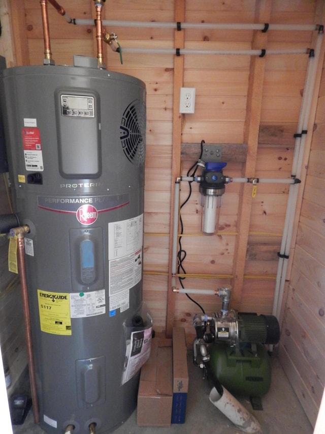 105 Gales Rd, Abbot, ME 04406 - utility room with heat pump water heater