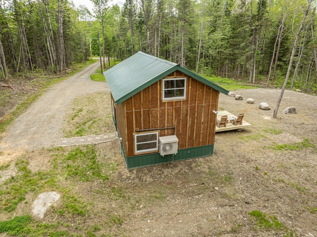 105 Gales Rd, Abbot, ME 04406 - view of outdoor structure with a wooded view