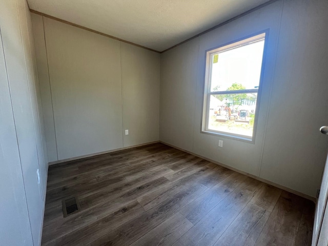 440 High St, Sanford, ME 04073 - unfurnished room with wood finished floors and crown molding