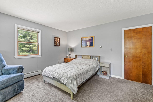 23 E Eleanor Ave, Standish, ME 04084 - bedroom with a baseboard radiator, carpet flooring, and a textured ceiling