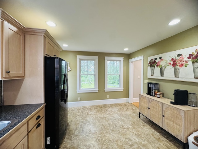 228 Mcburnie Rd, Presque Isle, ME 04769 - kitchen with freestanding refrigerator, dark countertops, recessed lighting, and light brown cabinets
