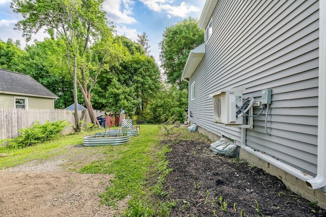 194 Larkin St, Bangor, ME 04401 - view of yard with a garden, ac unit, and view of scattered trees