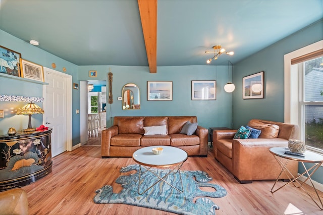 194 Larkin St, Bangor, ME 04401 - living area featuring healthy amount of natural light, wood finished floors, beamed ceiling, and baseboards