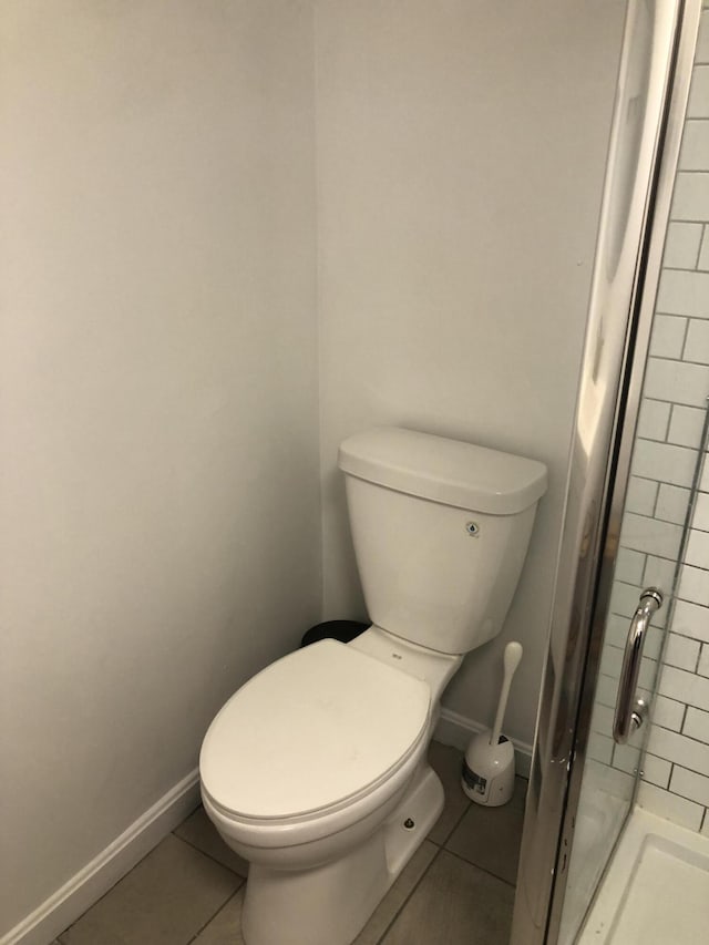 194 Larkin St, Bangor, ME 04401 - full bath with tile patterned floors, a shower stall, toilet, and baseboards