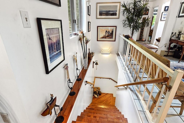 363 Winthrop Center Rd, Winthrop, ME 04364 - staircase featuring a baseboard heating unit and baseboards