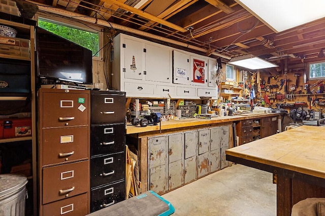 363 Winthrop Center Rd, Winthrop, ME 04364 - misc room with concrete floors and a workshop area