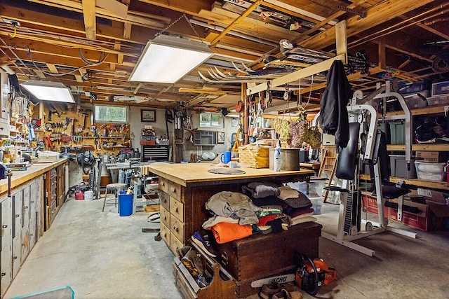 363 Winthrop Center Rd, Winthrop, ME 04364 - basement with a workshop area